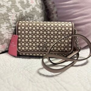 Kate Spade, brand new with tags, and plastic over hardware.